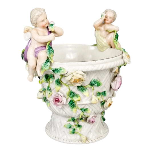 19th century German porcelain basket weave vase with rose garlands and cherubs
