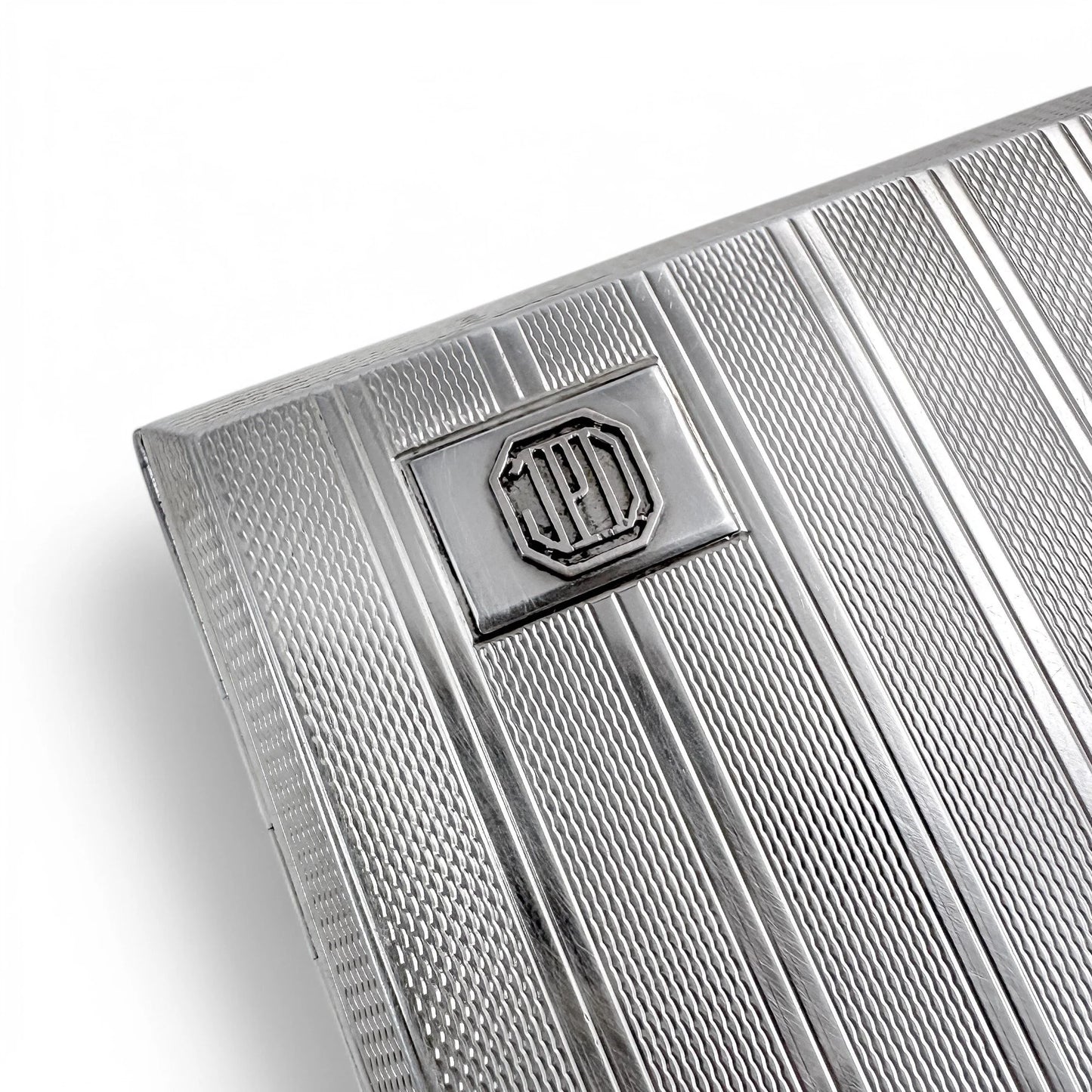 Large gilt sterling silver WWII cigarette case with engine-turned design
