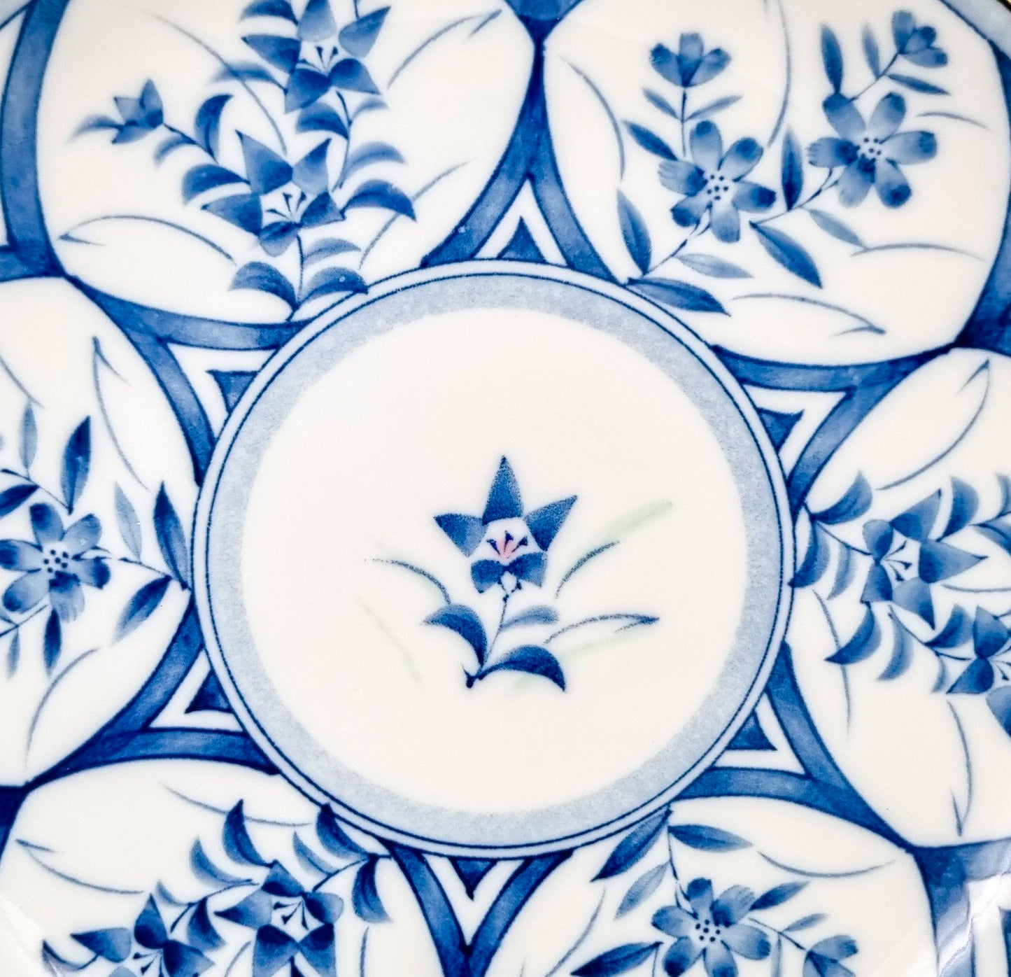 Vintage Japanese blue and white porcelain scalloped plate with flowers