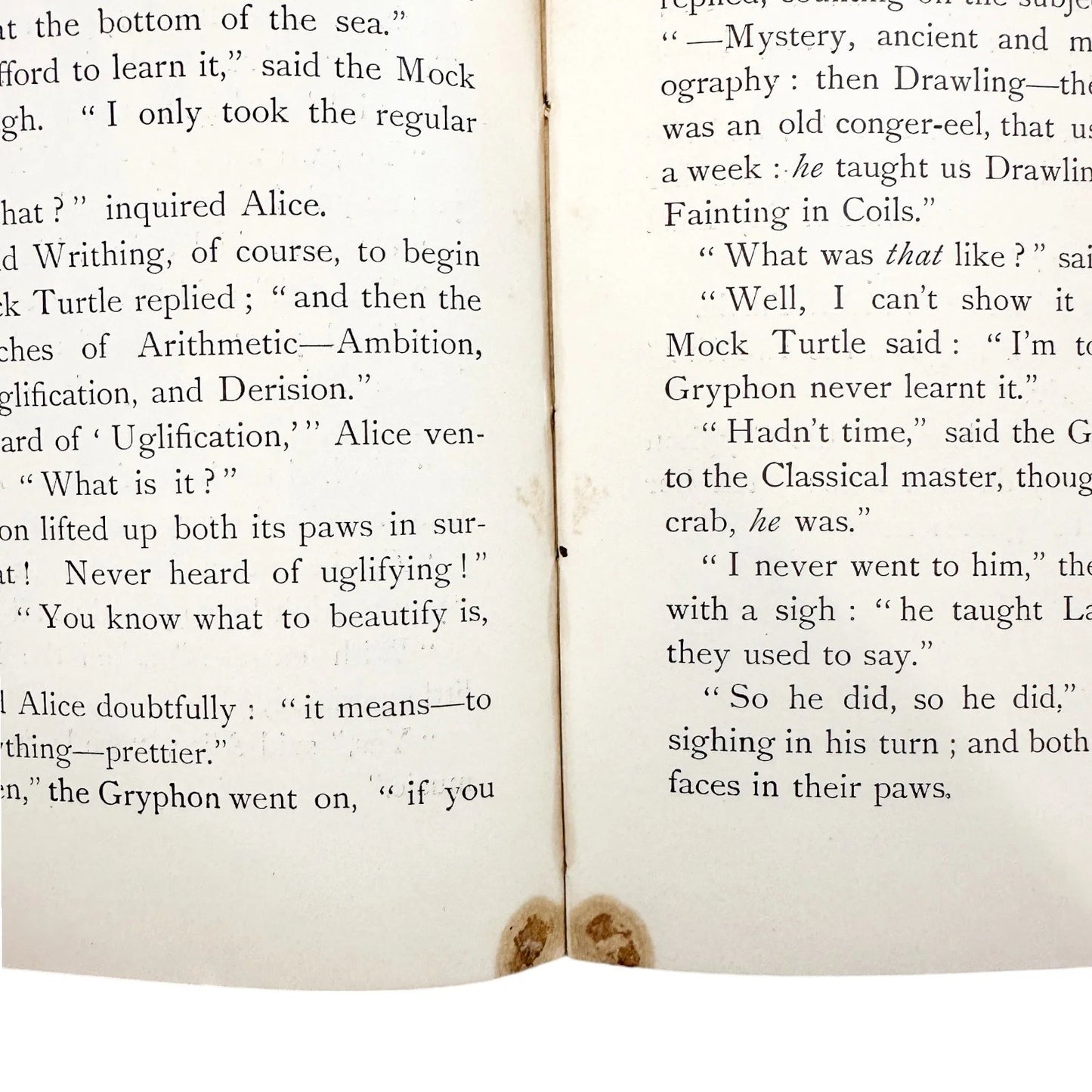 Illustrated leather bound first edition thus of "Alice's Adventures in Wonderland"