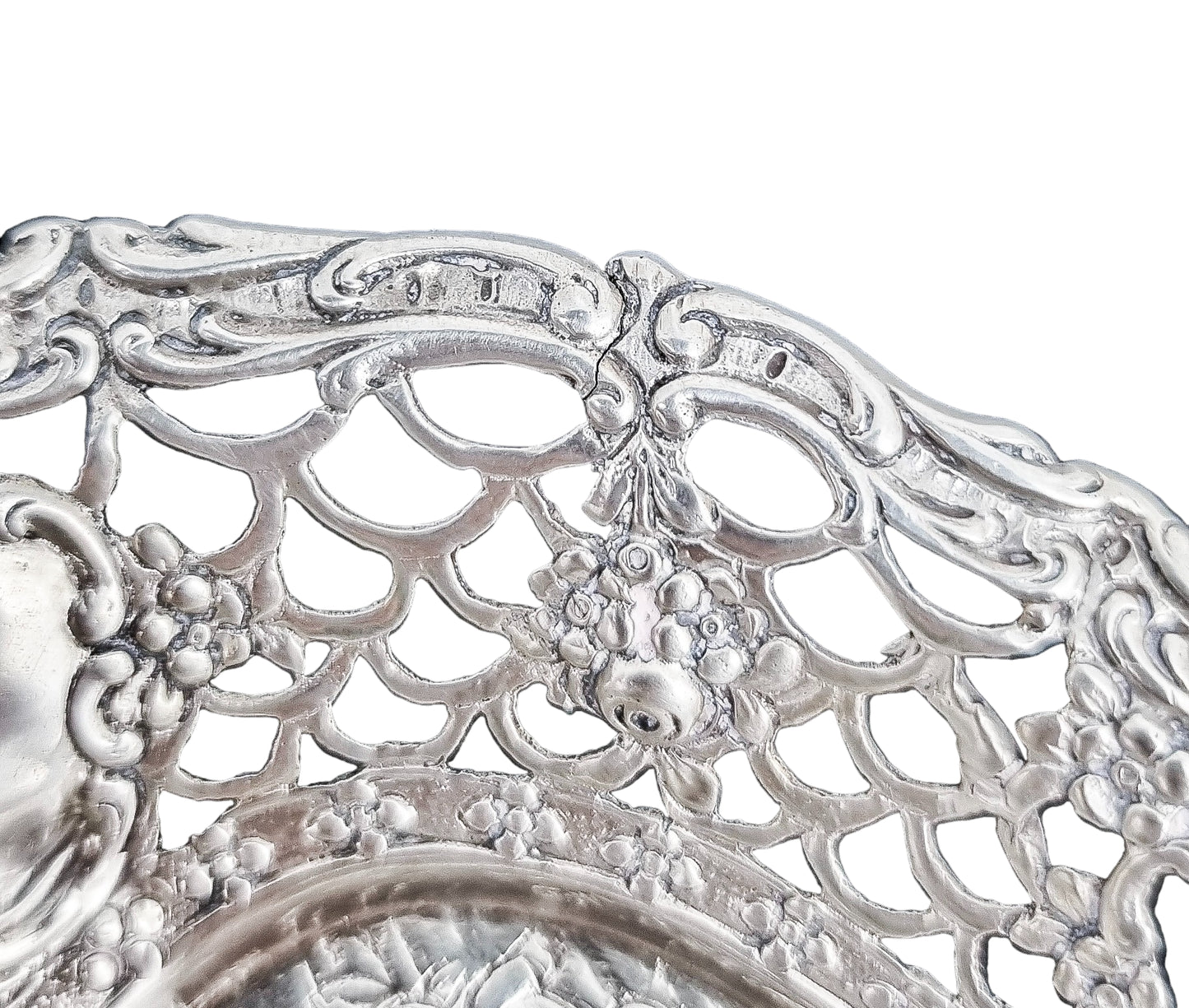 German silver pierced bonbon trinket dish with repousse cherubs and floral garlands