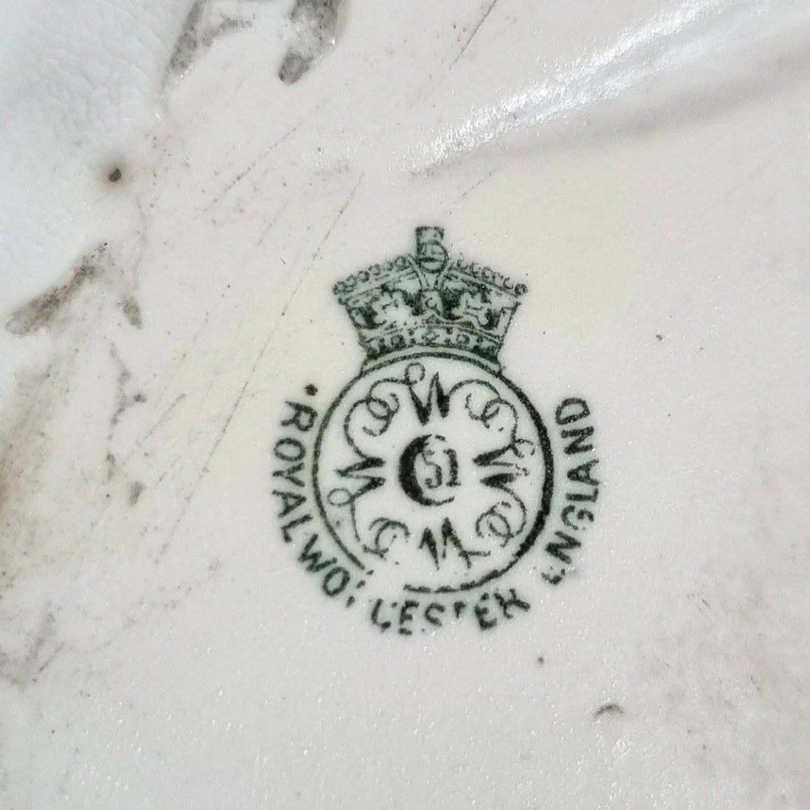Victorian Royal Worcester "Blanc de Chine" wall pocket in the shape of a leaf with a bird on top