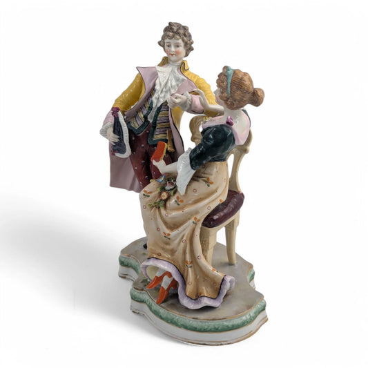 Late 19th century Sitzendorf porcelain courting couple figurine