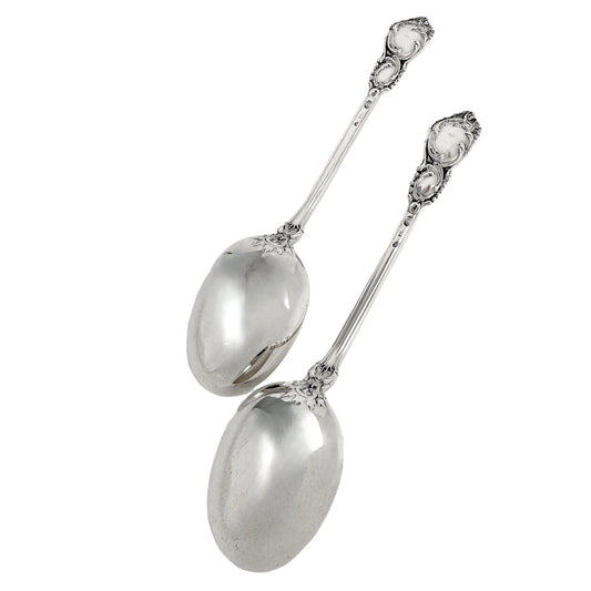Danish solid silver pair dessert spoons with rich foliate design
