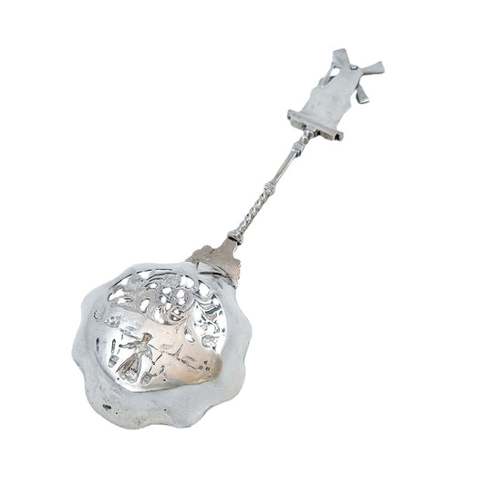 19th century Dutch silver tea strainer spoon with pastoral scene and windmill finial