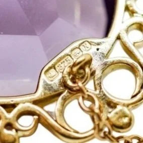 1980's huge 45 ct amethyst oval combination brooch and pendant in openwork 9ct gold setting