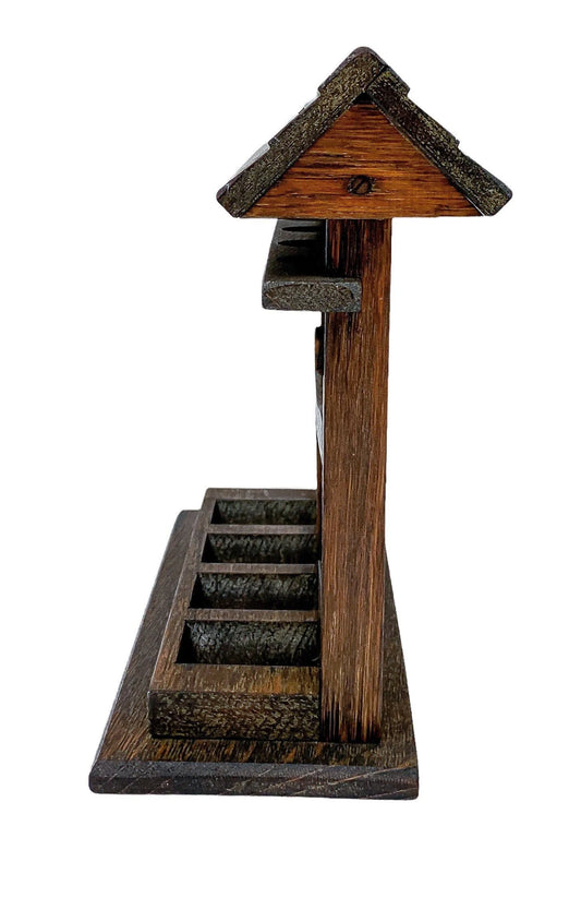 Vintage novelty oak 4-pipe rack stand in the form of a fence with roof on top