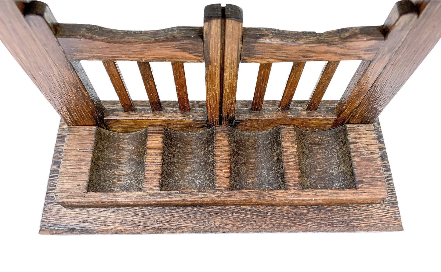 Vintage novelty oak 4-pipe rack stand in the form of a fence with roof on top