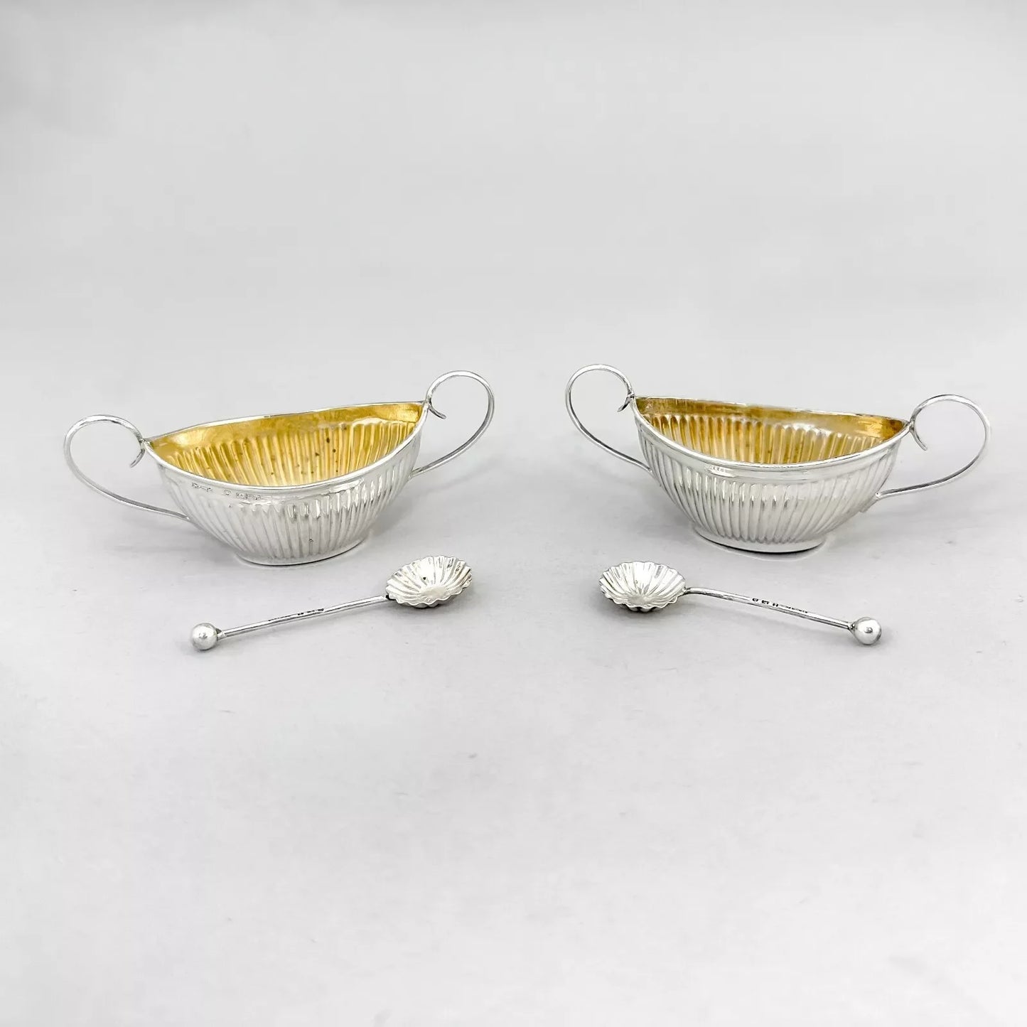 Neoclassical gilt sterling silver boxed navette salts with shell spoons