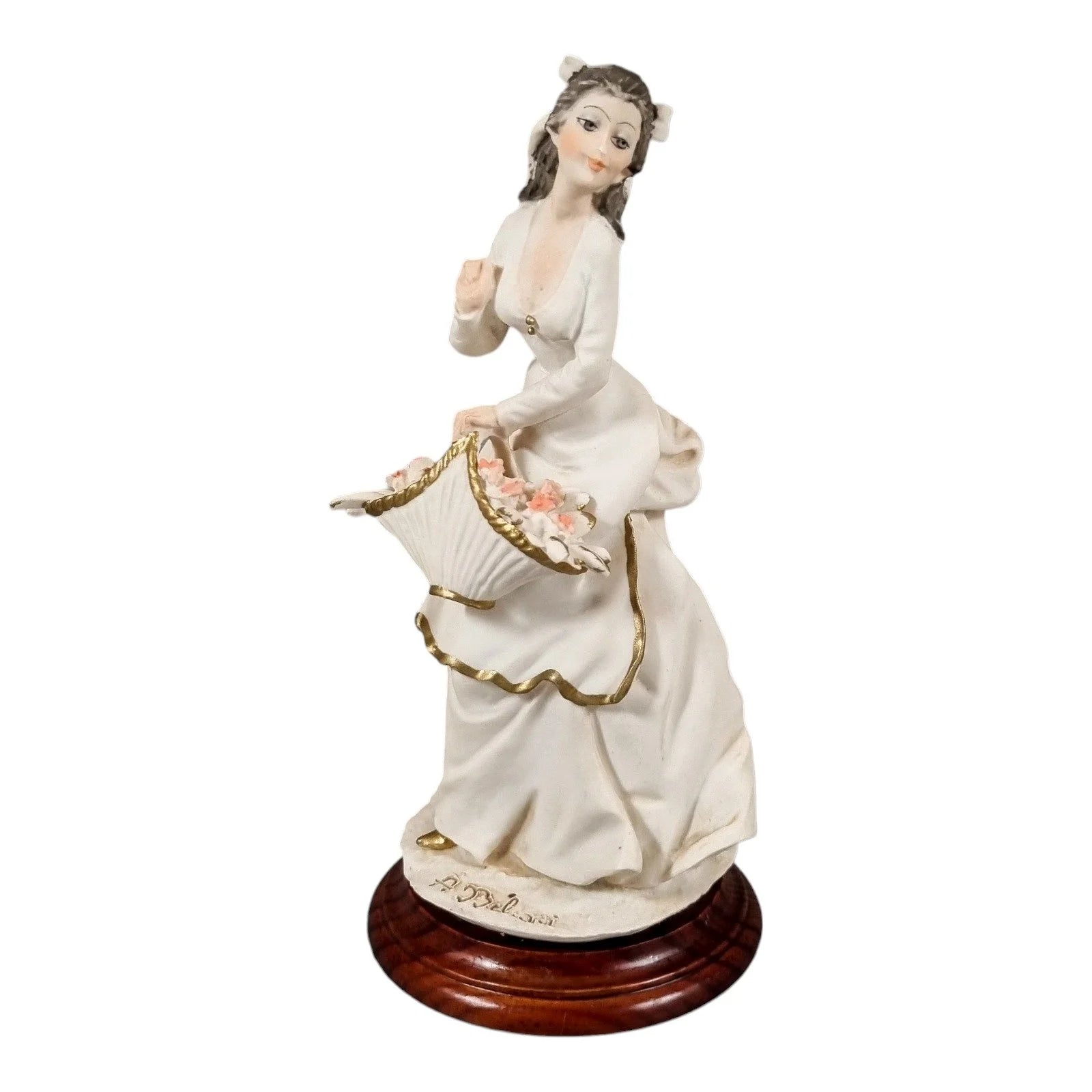 A. Belcari Capodimonte figurine of a young woman holding a flower basket
