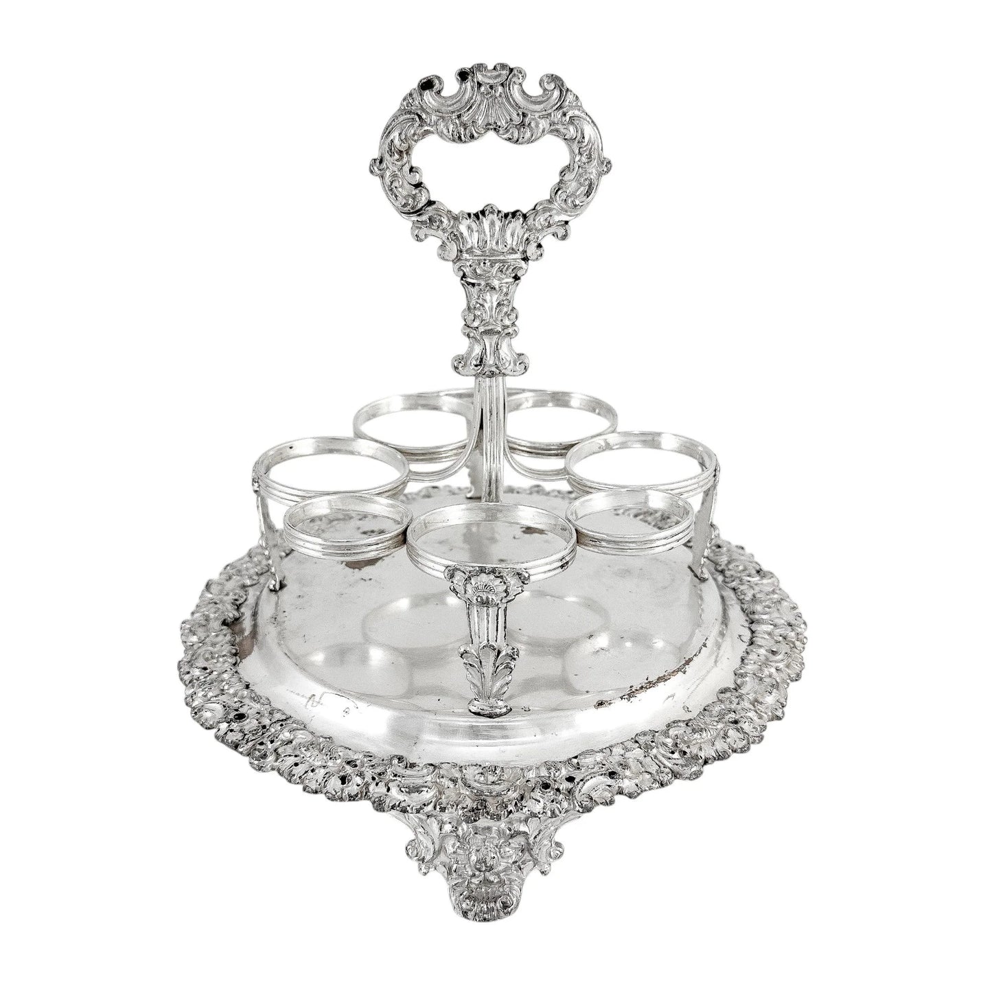 George III Old Sheffield silver plate cruet stand for 7 bottles, raised on paw feet