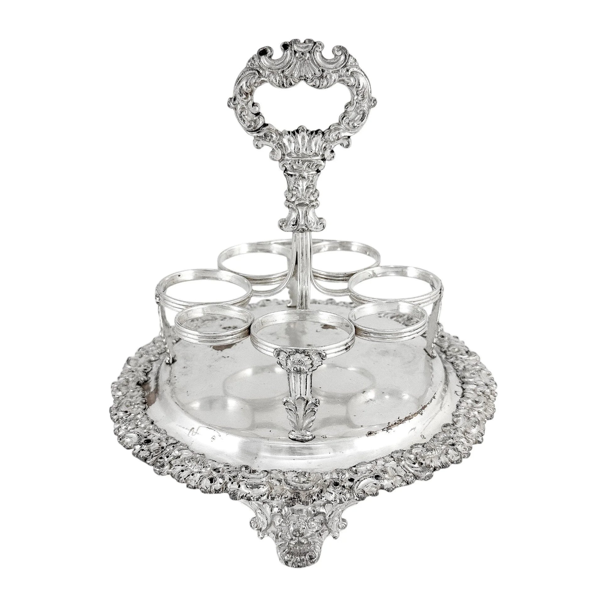 George III Old Sheffield silver plate cruet stand for 7 bottles, raised on paw feet
