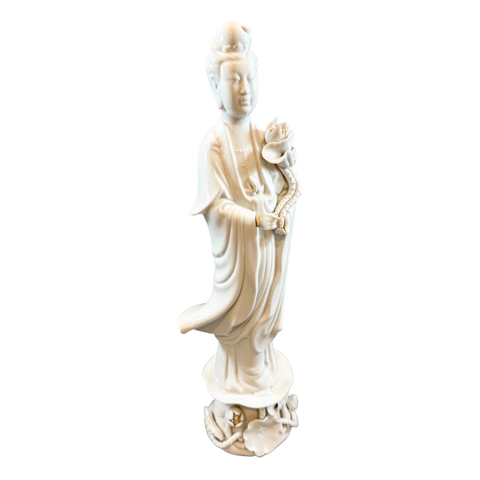 Blanc de Chine porcelain figurine of "Quan Yin on Lotus Blossom"