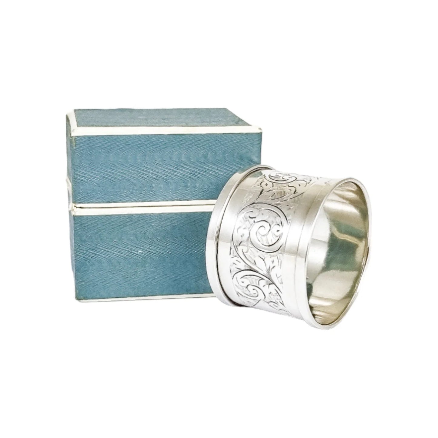 1930's large sterling silver napkin ring engraved with scrolling leaves