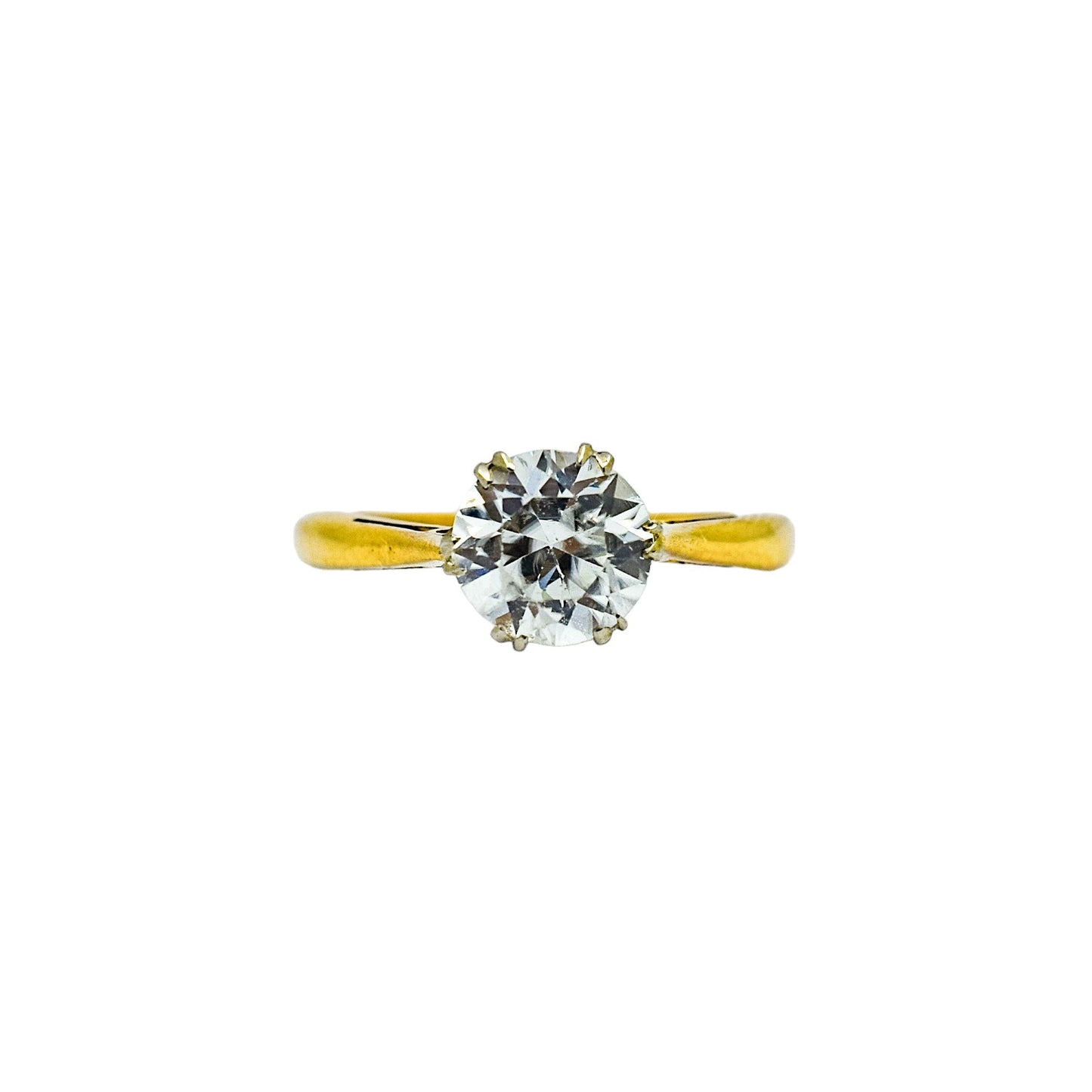 Vintage moissanite solitaire engagement ring set in yellow gold