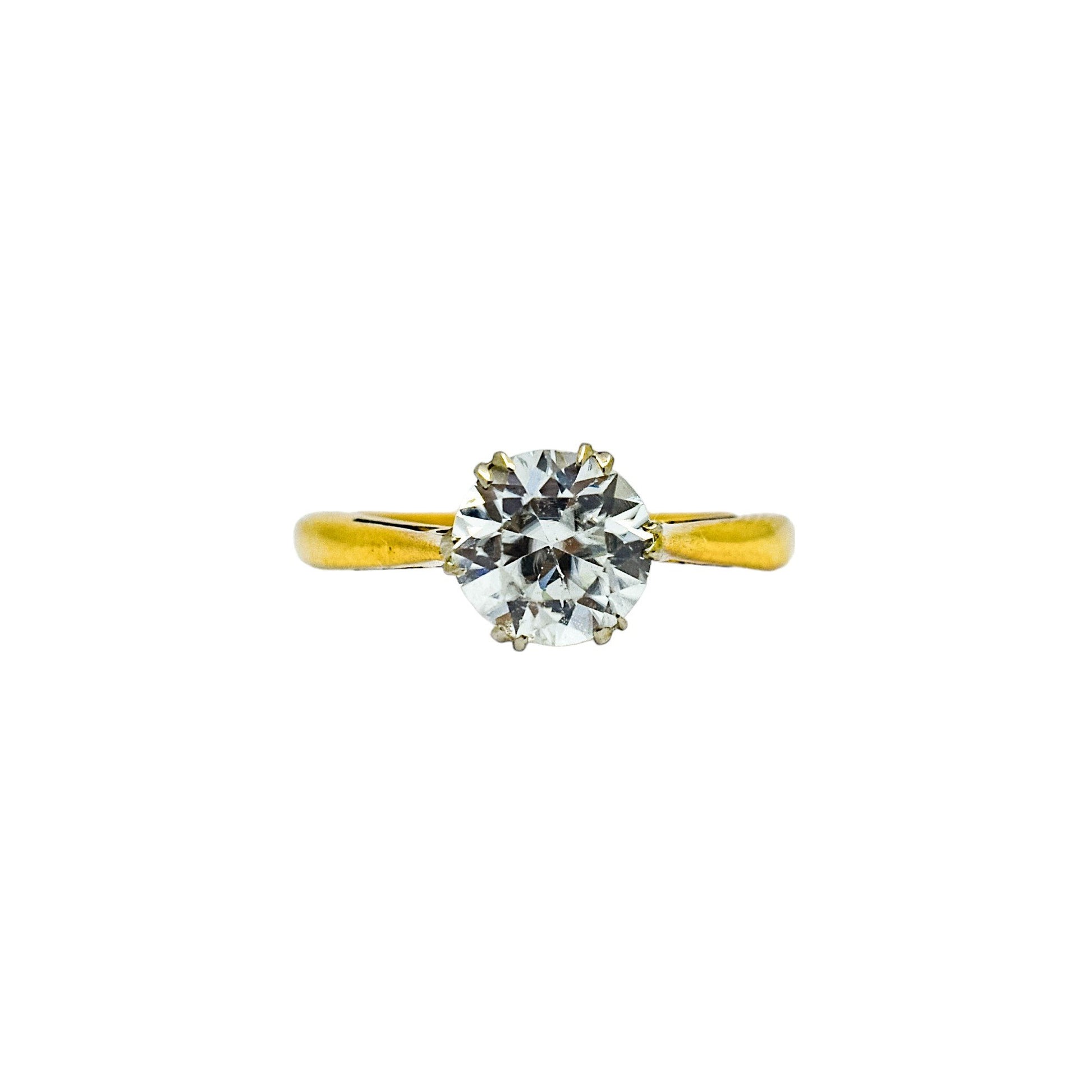 Vintage moissanite solitaire engagement ring set in yellow gold
