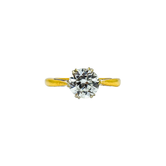 Vintage moissanite solitaire engagement ring set in yellow gold