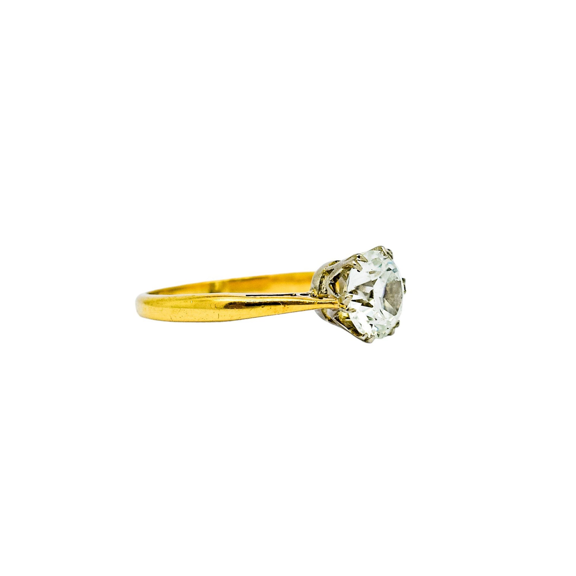 Vintage moissanite solitaire engagement ring set in yellow gold