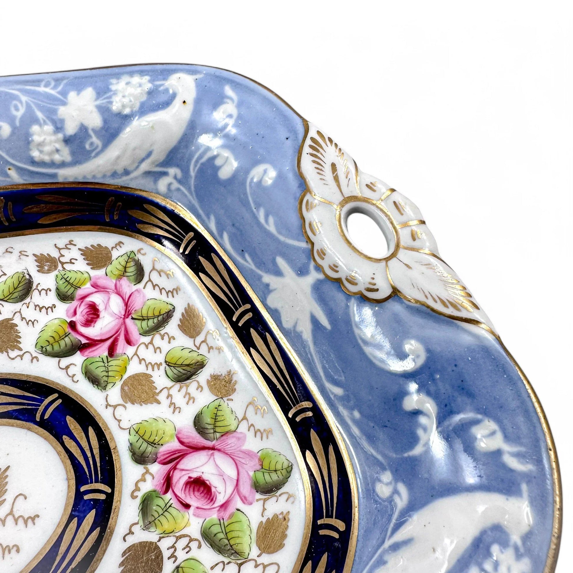 Rare New Hall Staffordshire hybrid porcelain dessert service with powder blue and rose decoration, circa 1820