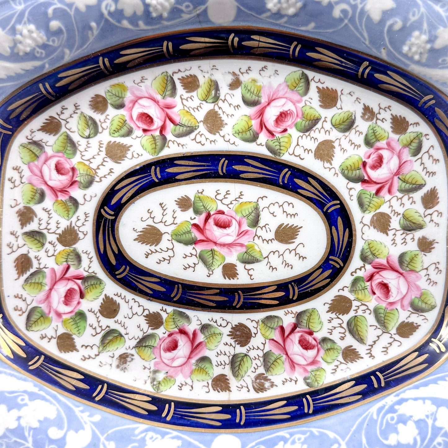 Rare New Hall Staffordshire hybrid porcelain dessert service with powder blue and rose decoration, circa 1820