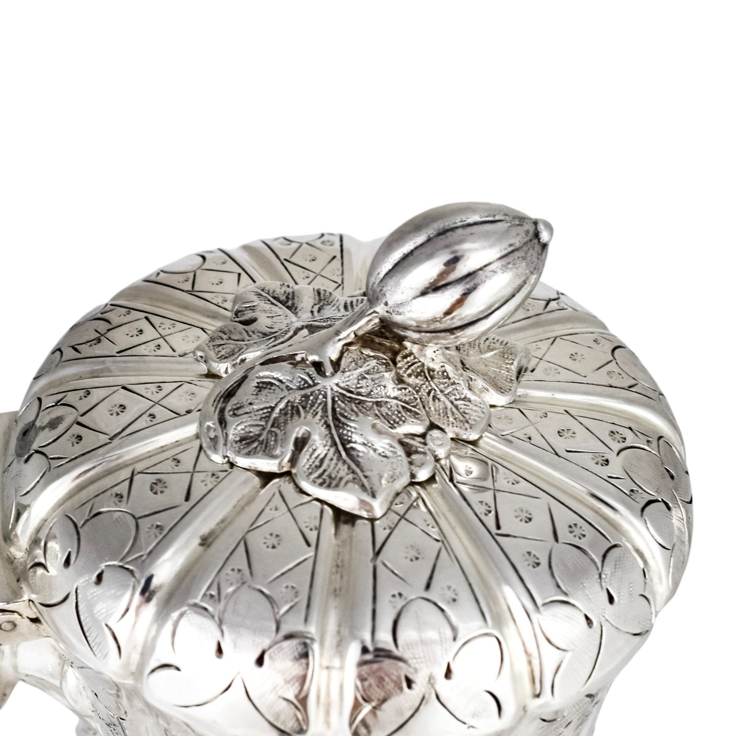 1860’s silverplate 4 piece tea and coffee set with nut finials and embossed flowers