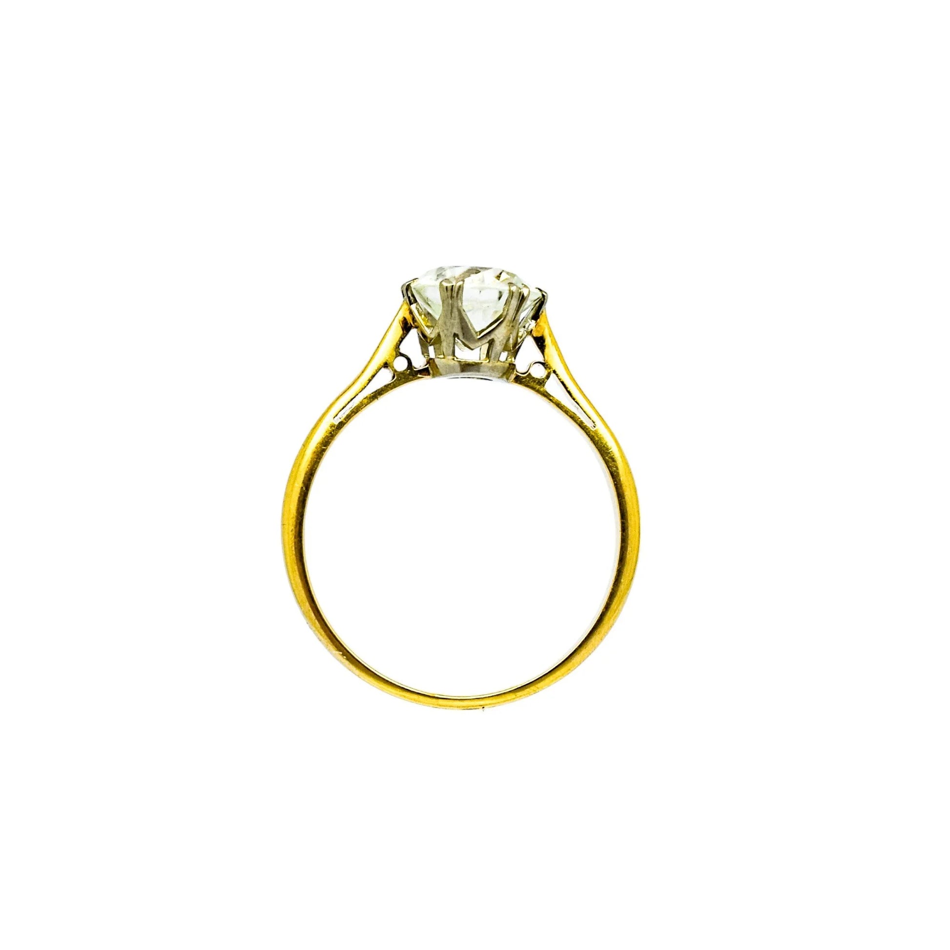 Vintage moissanite solitaire engagement ring set in yellow gold