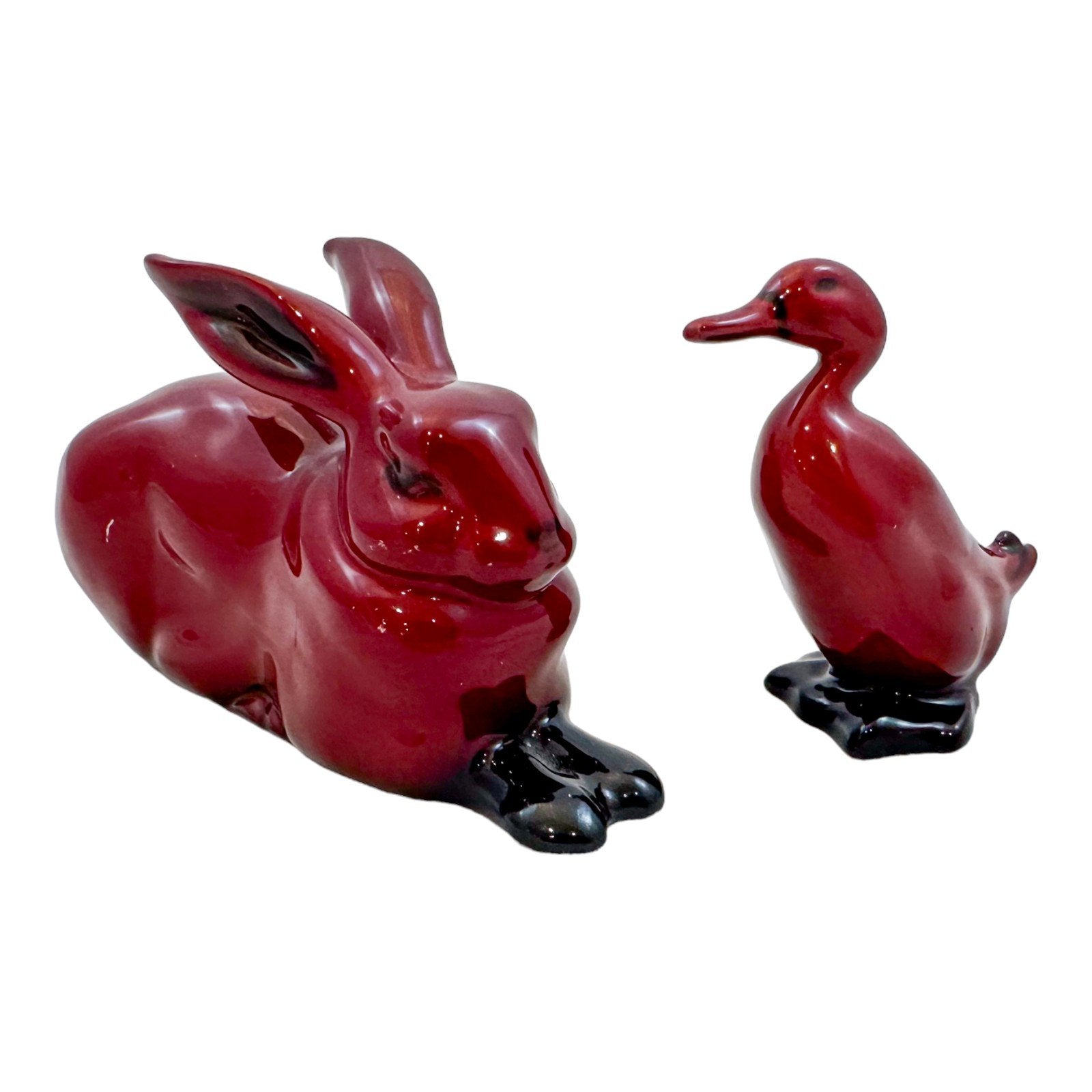 Pair of Charles Noke for Royal Doulton porcelain flambé "Duck" and "Hare" figurines