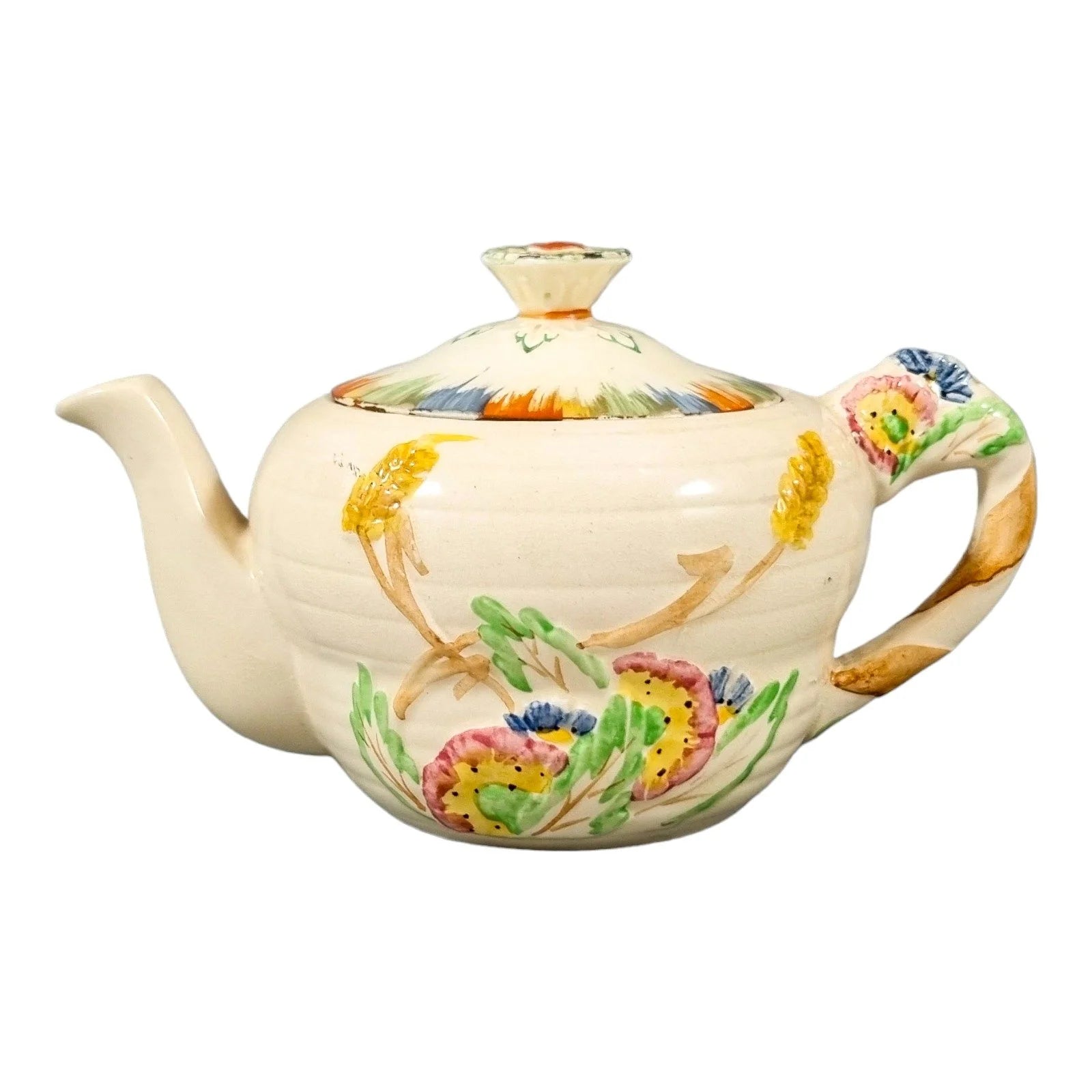 Art Deco bachelor teapot decorated with high-relief flowers and wheat stalks