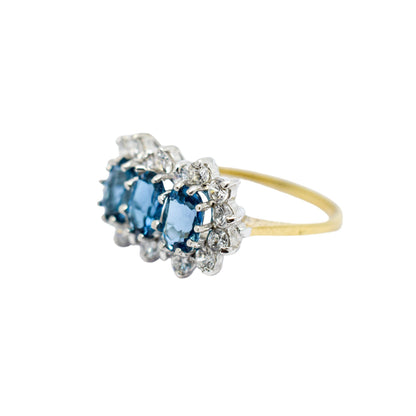 Vintage 1980's three-stone blue topaz cluster ring, 9ct yellow gold, size K 1/2