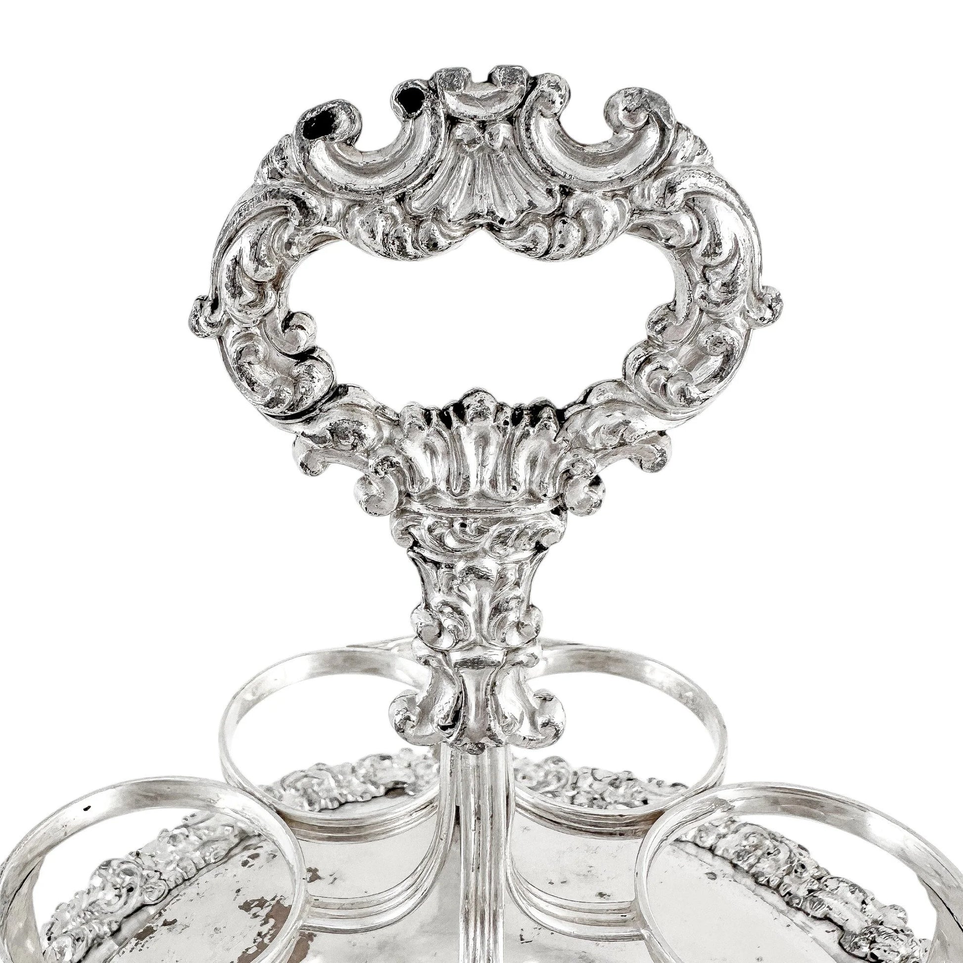 George III Old Sheffield silver plate cruet stand for 7 bottles, raised on paw feet