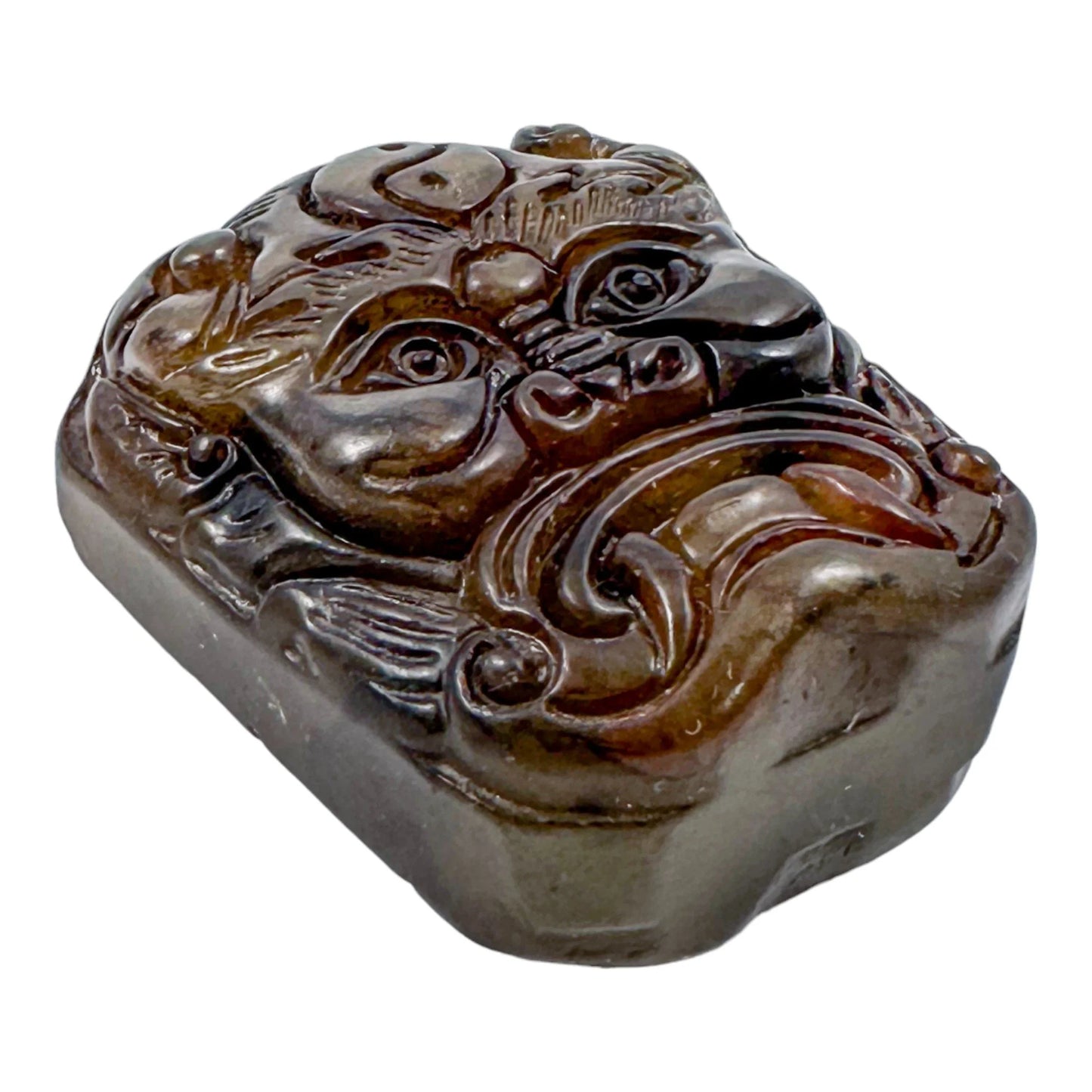 Qing Dynasty jade snuff bottle with demon mask and Yin/Yang symbol