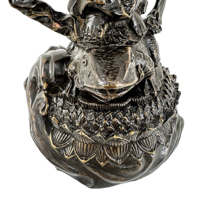 Chinese bronze tall statue of Guanyin resting on frog on lotus flower