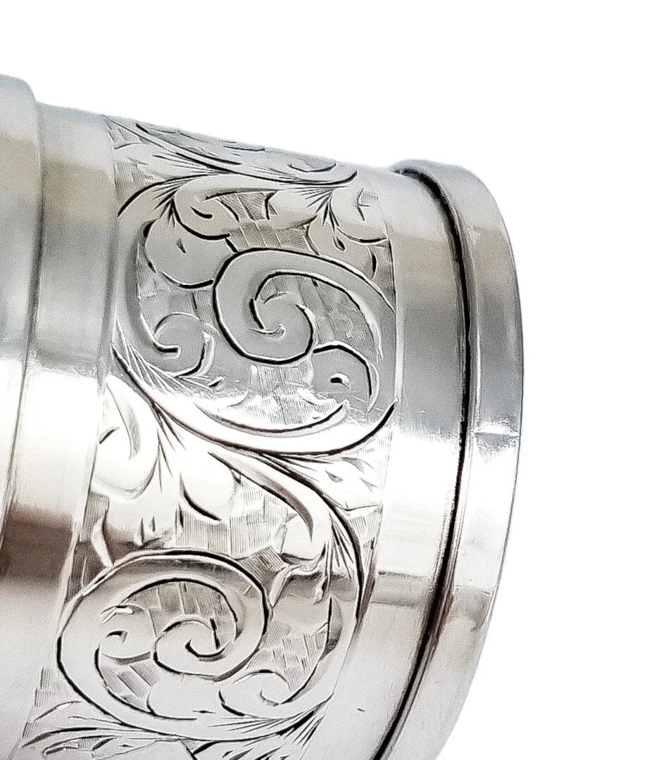 1930's large sterling silver napkin ring engraved with scrolling leaves