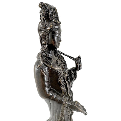 Chinese bronze tall statue of Guanyin resting on frog on lotus flower