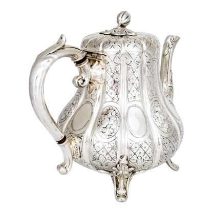 1860’s silverplate 4 piece tea and coffee set with nut finials and embossed flowers