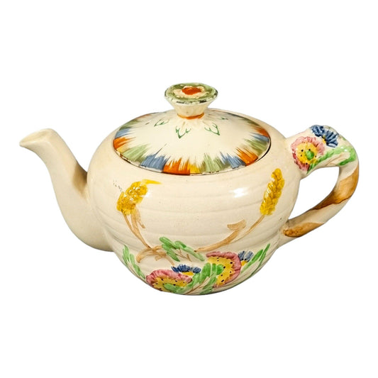 Art Deco bachelor teapot decorated with high-relief flowers and wheat stalks