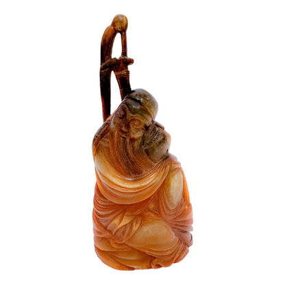 Antique Chinese pair of Immortals / Deities carved in buffalo horn, holding a staff and a lotus flower
