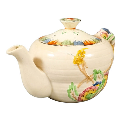 Art Deco bachelor teapot decorated with high-relief flowers and wheat stalks