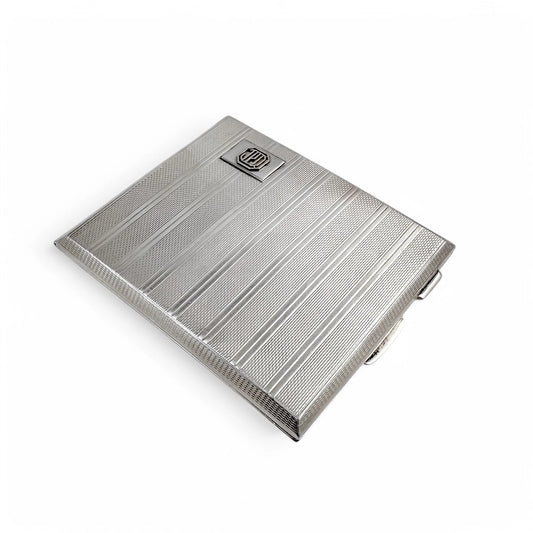Large gilt sterling silver WWII cigarette case with engine-turned design