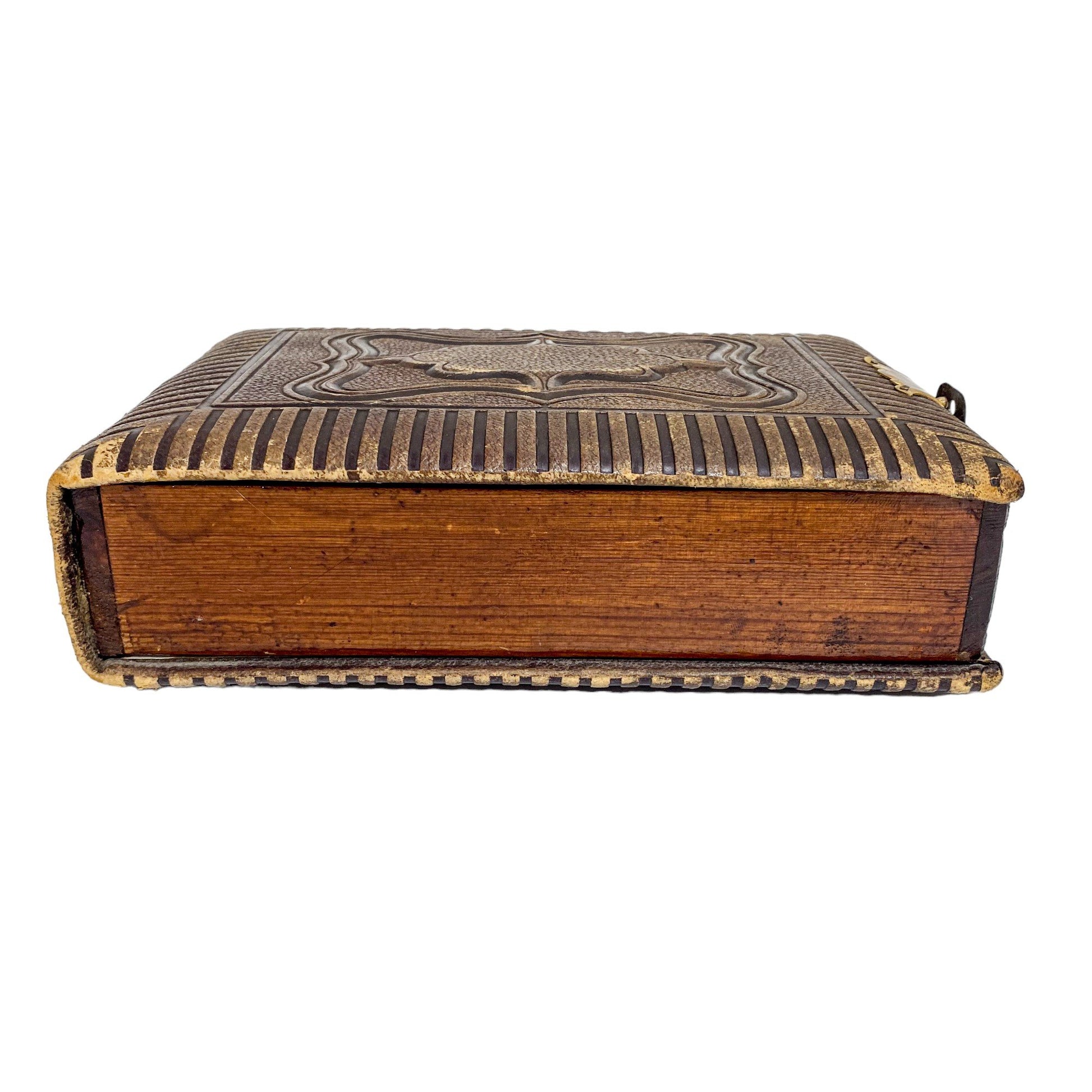 Storage box converted from Victorian tooled leather photo album with brass clasp
