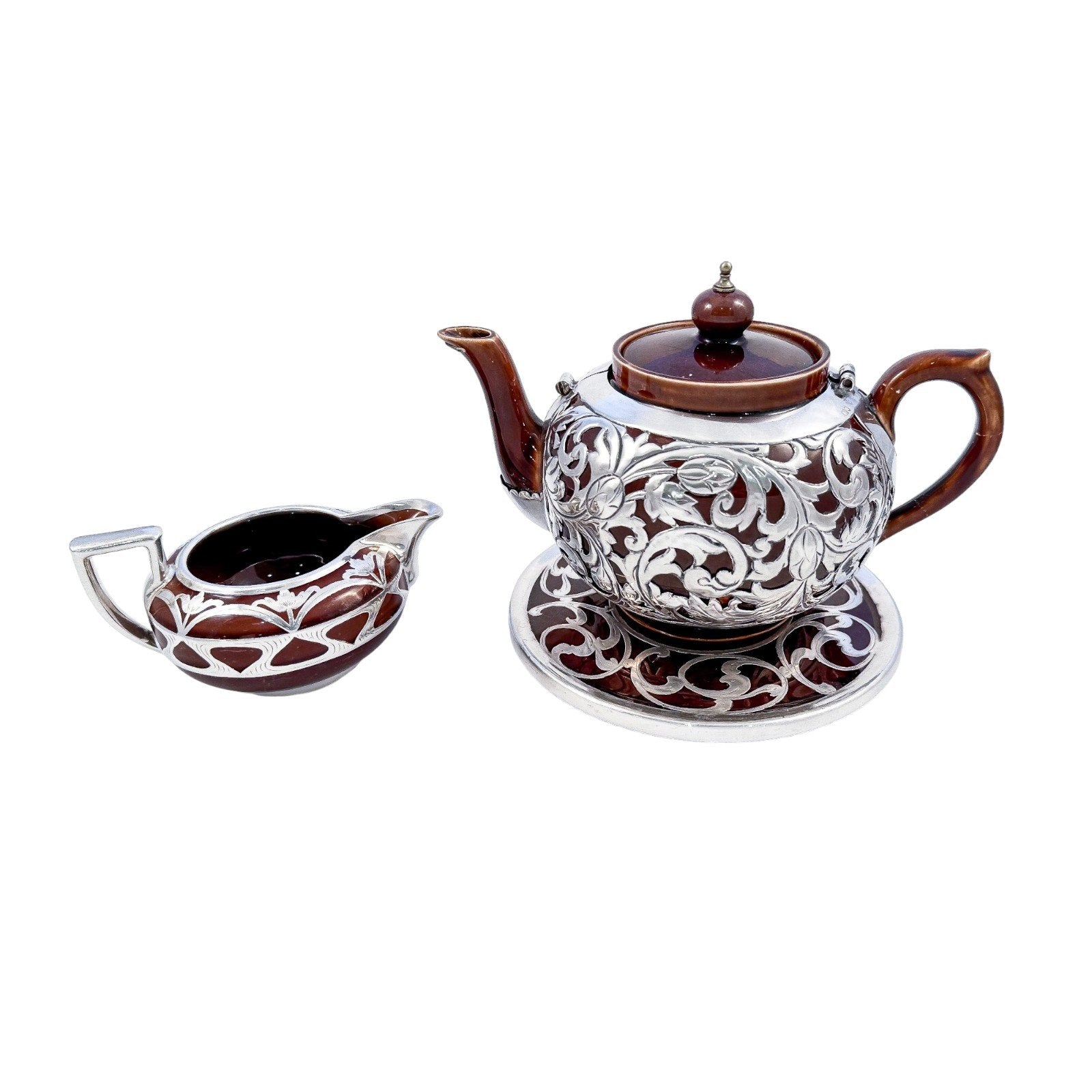Art Nouveau Lenox brown teapot, stand and creamer with sterling silver overlay