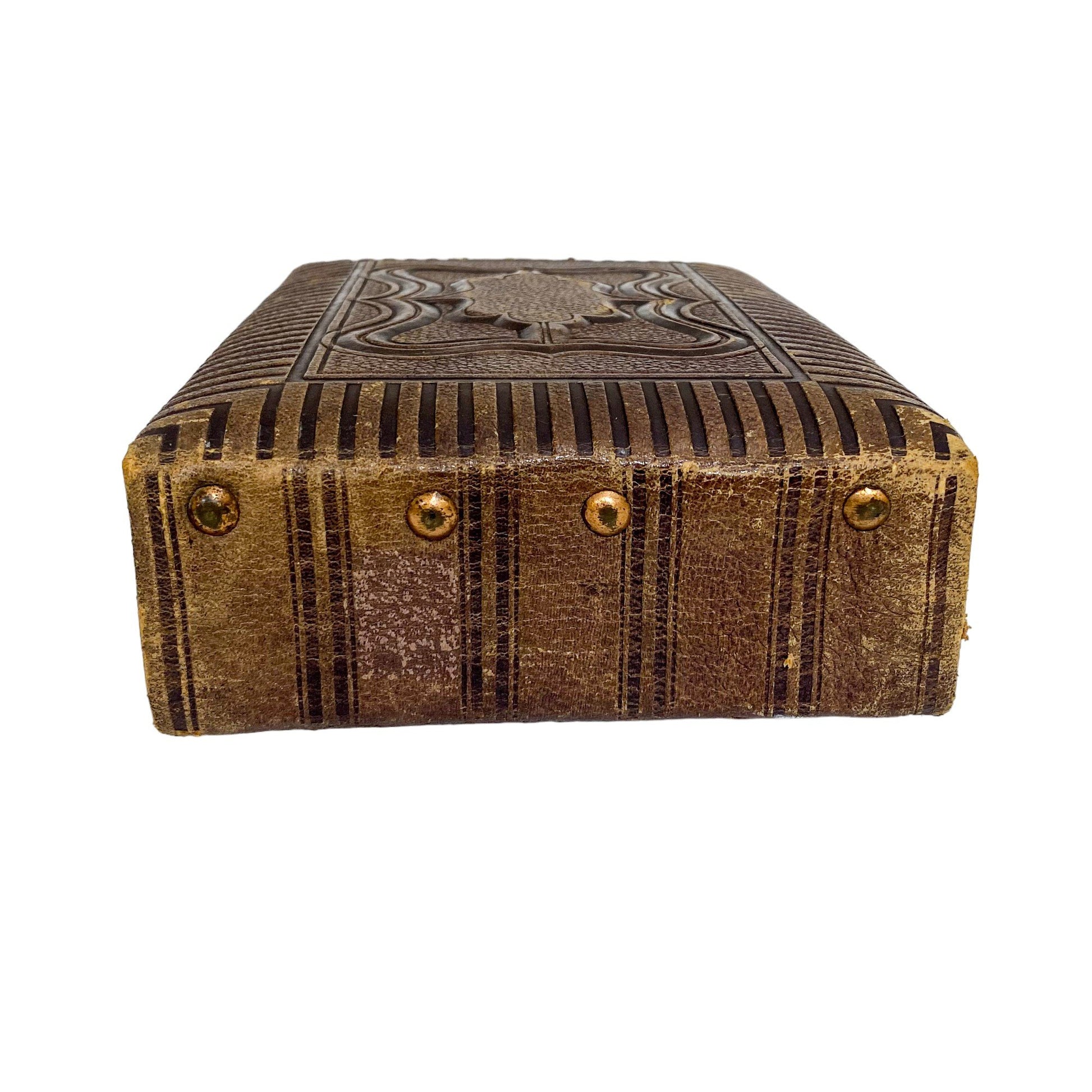 Storage box converted from Victorian tooled leather photo album with brass clasp