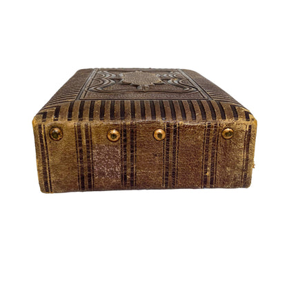 Storage box converted from Victorian tooled leather photo album with brass clasp