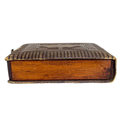 Storage box converted from Victorian tooled leather photo album with brass clasp