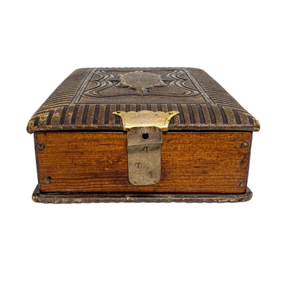 Storage box converted from Victorian tooled leather photo album with brass clasp