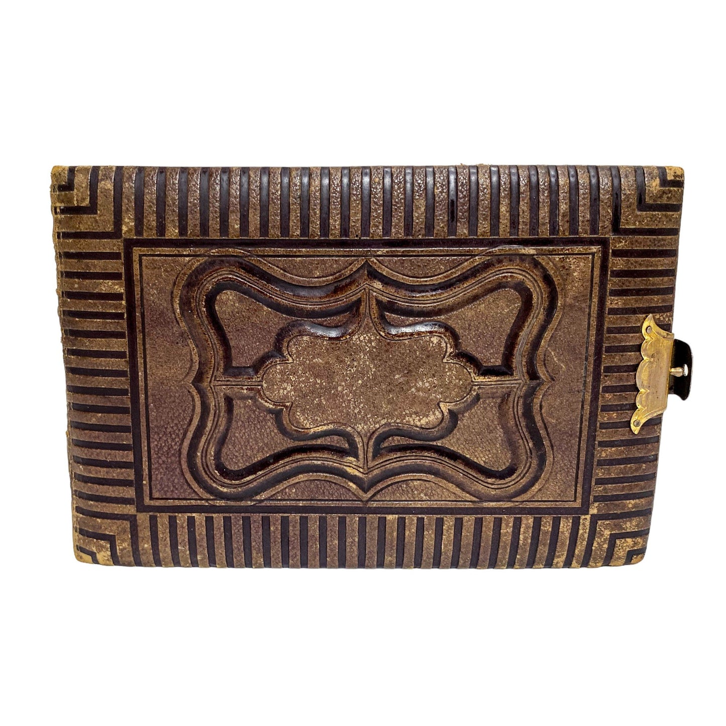 Storage box converted from Victorian tooled leather photo album with brass clasp
