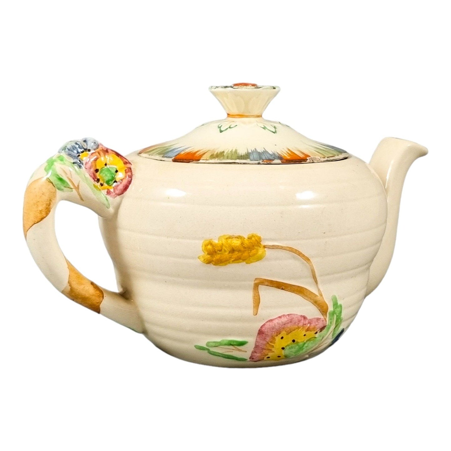 Art Deco bachelor teapot decorated with high-relief flowers and wheat stalks