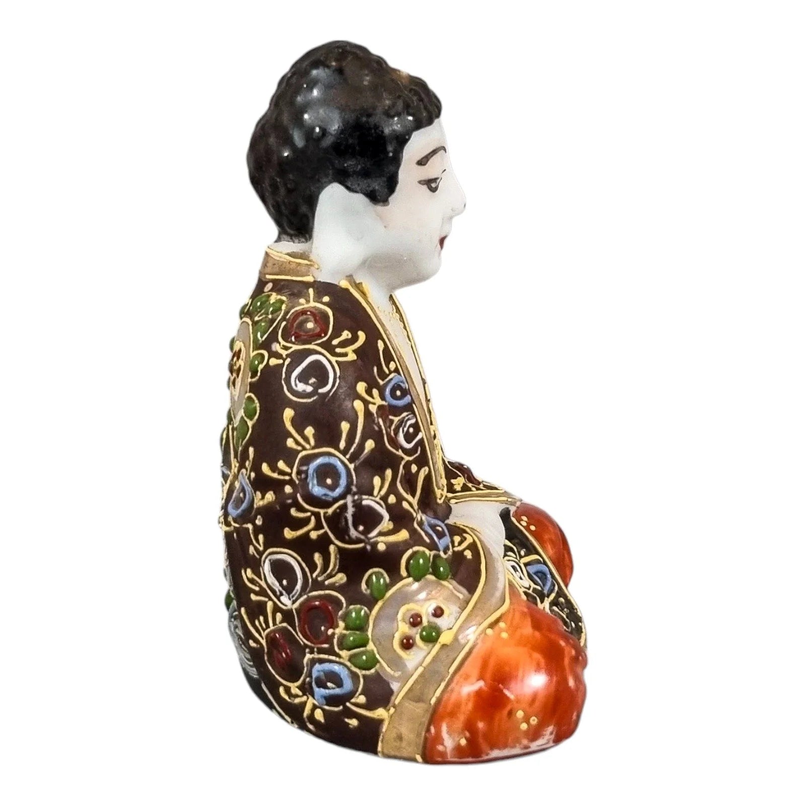 Meiji Japanese Kutani porcelain sitting Buddha figurine, enamel moriage by Dai Nippon Tsukuru
