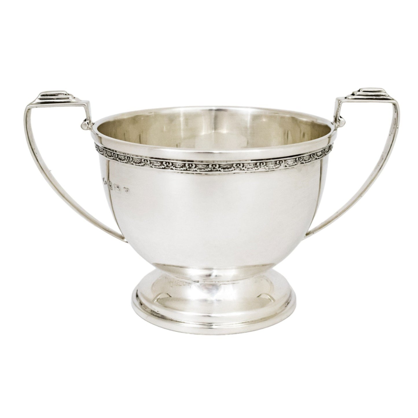 Three piece Art Deco sterling tea set with bow garlands and geometric handles