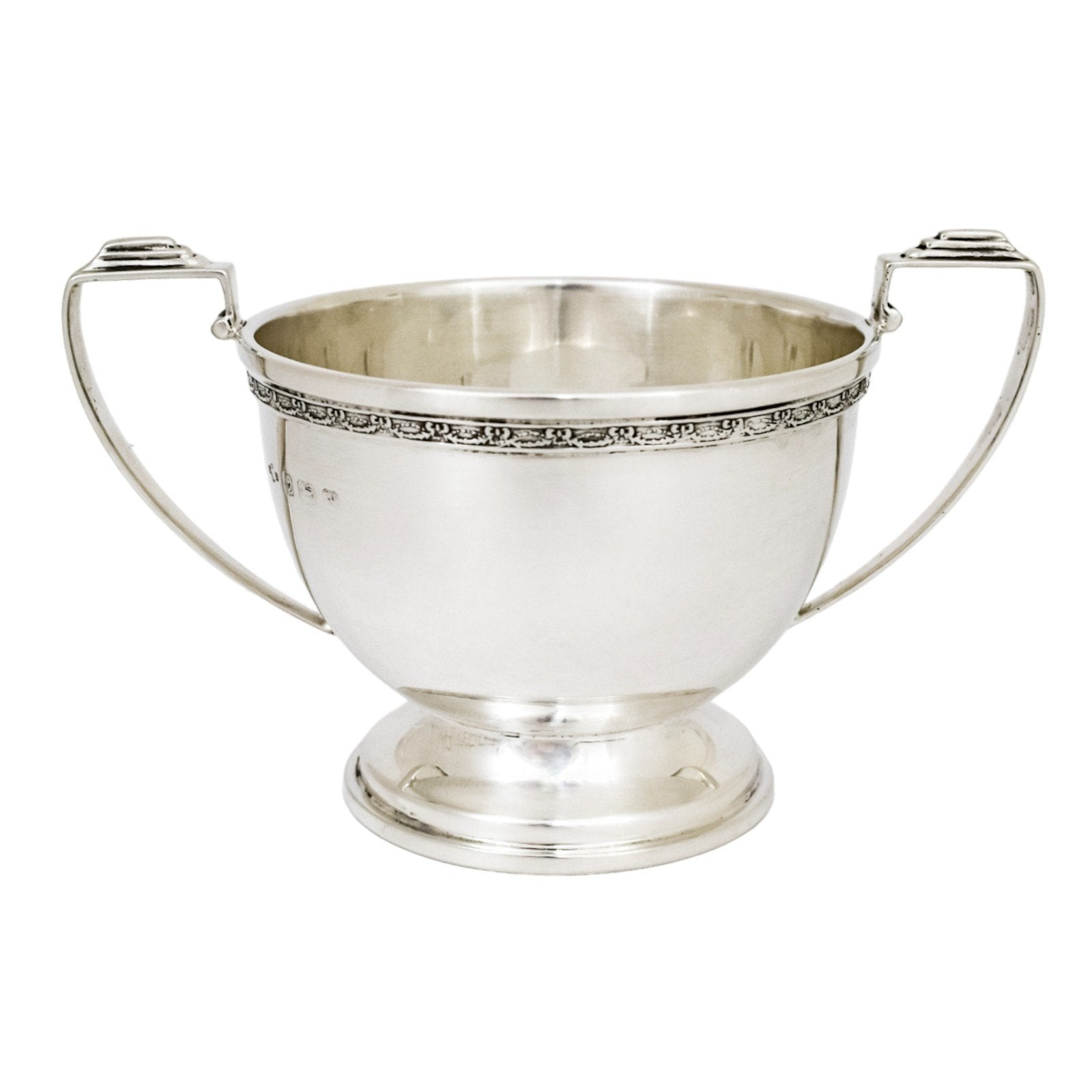 Three piece Art Deco sterling tea set with bow garlands and geometric handles